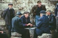 Ushguli, Georgia - June 12, 2014: Elderly Georgian men playing cards in the Caucasus Mountains village