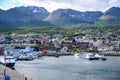 Ushuaia, Capital of Tierra del Fuego, Patagonia, Argentina. Colorful houses, boats on sea, hills and mountains. Royalty Free Stock Photo