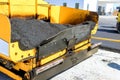 Using asphalt special machines and heavy vibration roller pavement works to asphalt a road with the use of asphalt