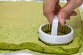 Shape the cake using a round cake mould.