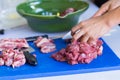 Using chopboard wrong color. chopping board for meat is red not blue for seafood