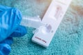Using Covid-19 Rapid Antigent test  kit process with drop solution liquid from nasopharyngeal swab Royalty Free Stock Photo