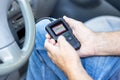 Using diagnostic car code reader to erase error codes and turn off check engine light