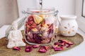 Using dry rose petals to make rose potpourri which is great for home scent. Royalty Free Stock Photo