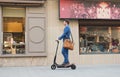 Using Electric Scooter on the street