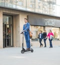 Using Electric Scooter on the street