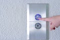 Using hands, press the elevator up and keypad elevator Royalty Free Stock Photo