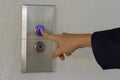 Using hands, press the elevator up and keypad elevator Royalty Free Stock Photo