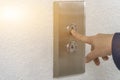 Using hands, press the elevator up and keypad elevator Royalty Free Stock Photo