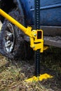 Using a high-lift jack closeup Royalty Free Stock Photo