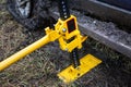 Using a high-lift jack closeup Royalty Free Stock Photo