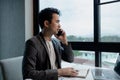 he is using his phone to find information to use in presenting information, Entrepreneurs use smartphones to keep in touch with