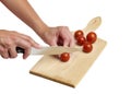 Using kitchen knife to cut tomato Royalty Free Stock Photo