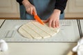 Using the kitchen silicone baking mat with markings and tips in the process of cooking in the kitchen with copy space