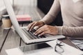 Using laptop at cafe. Business woman working on computer at home. Royalty Free Stock Photo