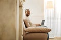 Cheerful businessman working from home