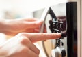 Using microwave oven, close up photo Royalty Free Stock Photo