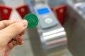 Using one way ticket coin token. Taichung MRT Metro system. Taiwan. Royalty Free Stock Photo