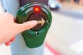 Using a Pedestrian Crossing Button at Crosswalk Royalty Free Stock Photo