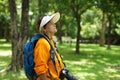 The old woman taking photo on camera. Grandmother wants to capture the moment. Royalty Free Stock Photo