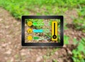 Using samrt tablet for farming concept. .new generation apps showing all about farm Royalty Free Stock Photo
