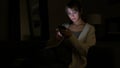 Using Smartphone Late Night in Dark Room, Woman Royalty Free Stock Photo