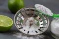 baking soda on drain in kitchen sink from glass jar. Close up. Eco friendly house cleaning concept. Royalty Free Stock Photo