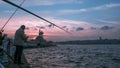 Uskudar at Sunset, Uskudar Landscape - Istanbul , Turkey Ã¢â¬â Bosphorus - Fisher man / fisher Royalty Free Stock Photo