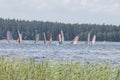Usma lake, Latvia - June 15, 2019: Wind surfers competition on lake Usma.