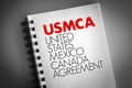 USMCA - United States Mexico Canada Agreement acronym on notepad, concept background