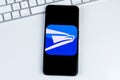 USPS MOBILE app logo on a smartphone screen. Royalty Free Stock Photo