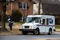 USPS Postal van with mailman - 2 Royalty Free Stock Photo