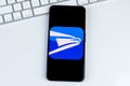 USPS United States Postal Service app logo on a smartphone screen.