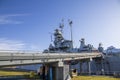 The USS Alabama Battleship with a bridge up to the ship and  blue sky at USS Alabama Battleship Memorial Park in Mobile Alabama Royalty Free Stock Photo