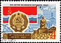 USSR - CIRCA 1967: Post stamp printed in the USSR shows Coat of Arms, Flag and monument Estonian SSR