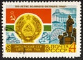 USSR - CIRCA 1967: Post stamp printed in the USSR shows Coat of Arms, Flag and monument Lithuanian SSR, serie 50 years