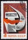USSR - CIRCA 1967: Postage stamp 4 kopeck printed in the Soviet Union shows newspaper headline, hammer and sickle with
