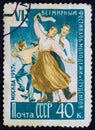USSR - CIRCA 1957: Postage stamp 40 kopeck printed in the Soviet Union shows several young couples dancing. Post stamp