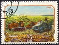 USSR - CIRCA 1956: A postage stamp printed in the USSR shows harvesting corn in collective farm peasantry in Soviet