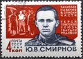 USSR - CIRCA 1964: A postage stamp printed in USSR shows Hero of USSR Guard Soldier Yu.V.Smirnov 1925-1944, from the Royalty Free Stock Photo