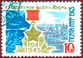 Postage stamp printed in the USSR shows gold Star the Hero and view of the city with the inscription `Hero City Odessa`, 1941-1945