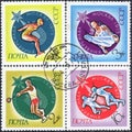 Postage stamps printed in the USSR with the image of sports and the inscription in Russian `Universiade. Moscow` Royalty Free Stock Photo