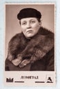 USSR - circa 1960s: studio portrait of a woman in a coat with a fur collar.