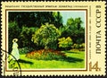 USSR - CIRCA 1973: a stamp printed by USSR shows a picture Lady in Garden, by Claude Monet, 1867, series Paintings in