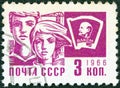 USSR - CIRCA 1966: A stamp printed in USSR from the `Society and Technology` issue shows a young boy and girl and Lenin emblem