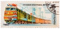 Stamp printed in the USSR Russia showing Locomotive with the inscription Cargo electric locomotive VL-82i