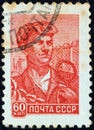 USSR - CIRCA 1958: A stamp printed in USSR shows a steel worker, circa 1958.