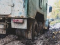 USSR military truck URAL on the road. green Russian Cargo Truck stuck in the mud Royalty Free Stock Photo