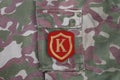 USSR military uniform - Soviet Army Commandant shoulder patch on camouflage uniform background