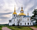 Ust-Kuda, Russia - 24 June 2020: Russian rural landscape with Church of Kazan icon of mother of God